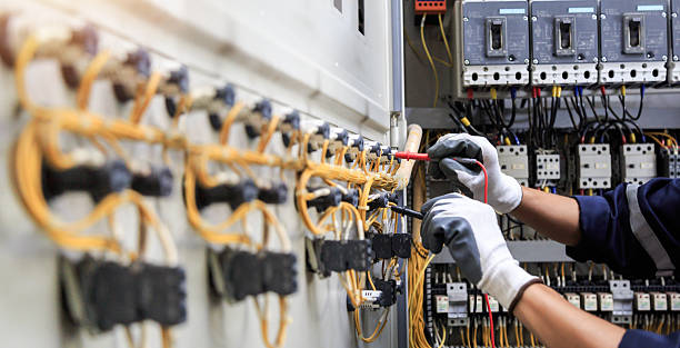 Professional Electrician technician working in Dover Base Housing, DE